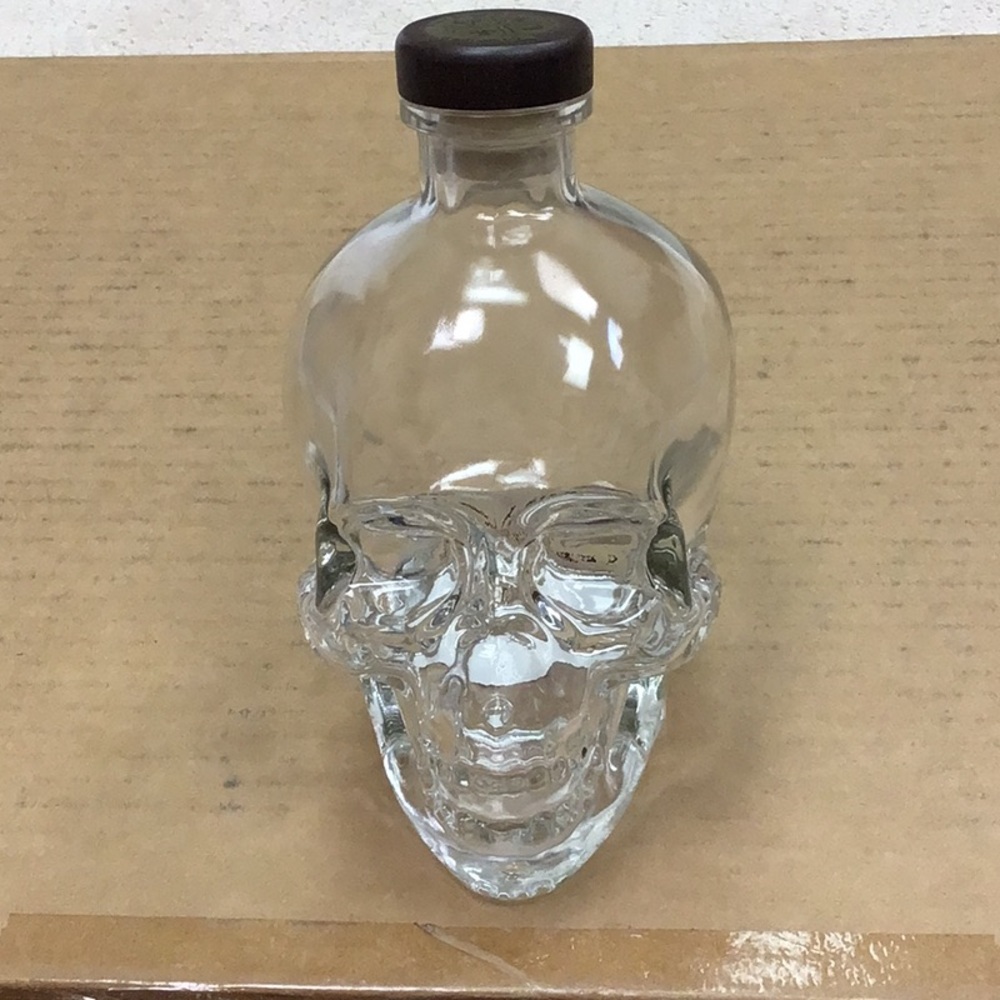 Clear Skull Glass Bottle with Black Cap